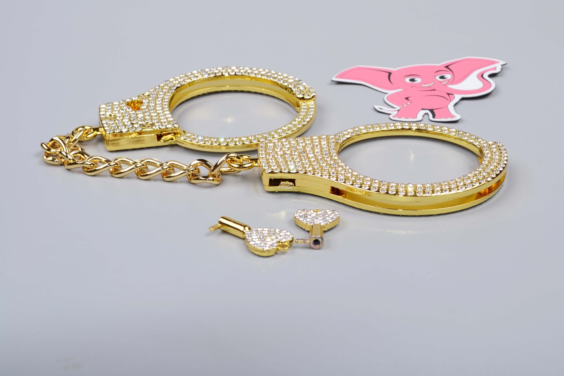 Zlaté kovové putá na ruky Shiny Obsession