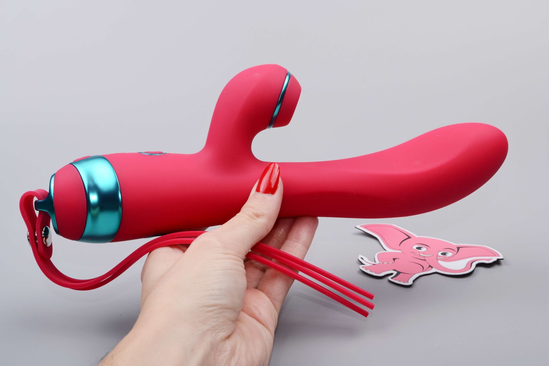 Adore Magenta G Touch tlakový vibrátor (22,8 cm), v ruke