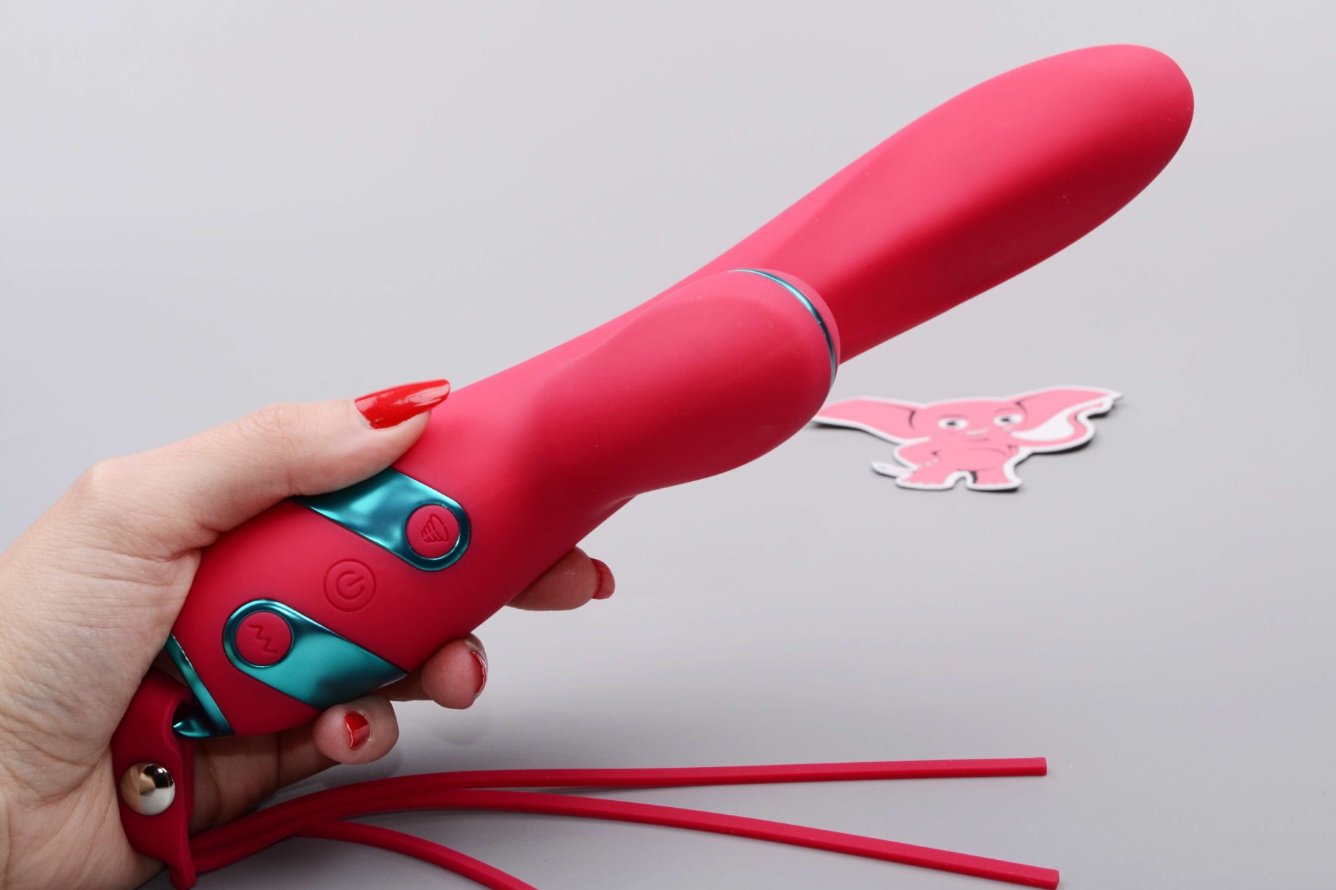 Adore Magenta G Touch tlakový vibrátor (22,8 cm), v ruke