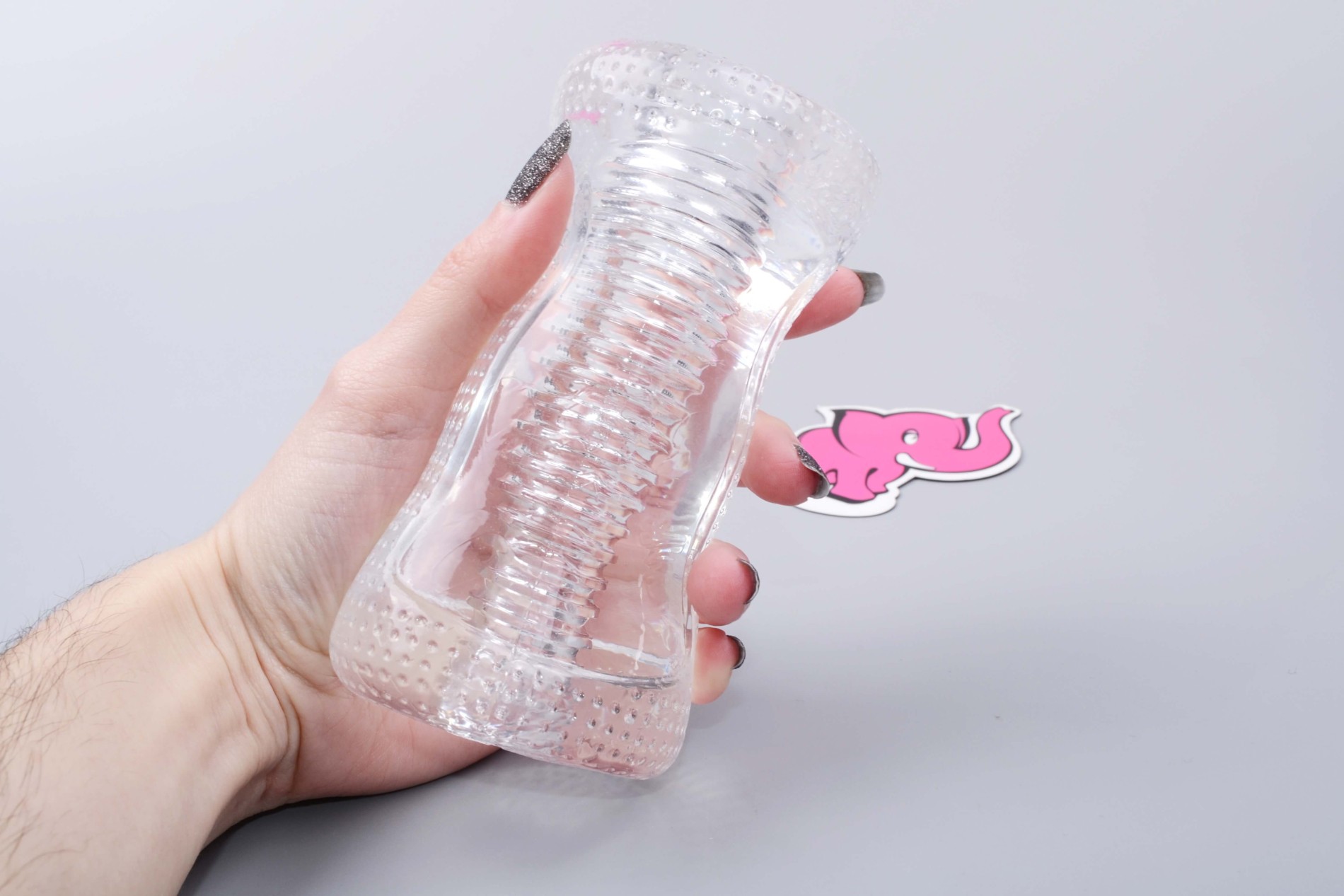 Masturbátor Clear Jack, v ruke