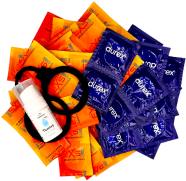 Súprava znecitlivujúcich kondómov – Delay pack (68 ks) + silikónové putá Handcuffs
