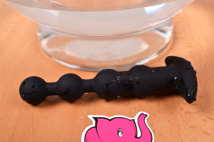 Análne guličky Vibro Bubbles - vedľa sklenenej nádoby